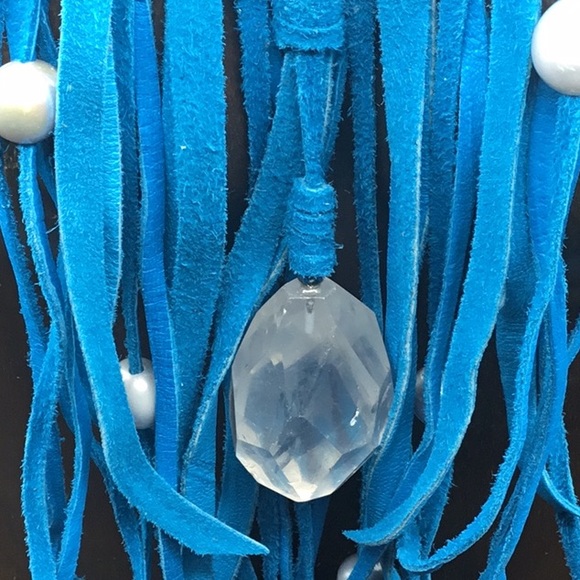 Leather Wrapped Neck with Tassel Drop